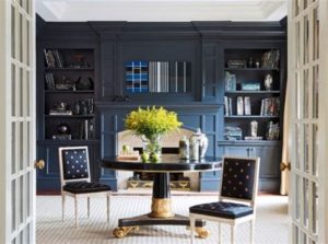 Painting a wall of built-ins gives a new character to the space.