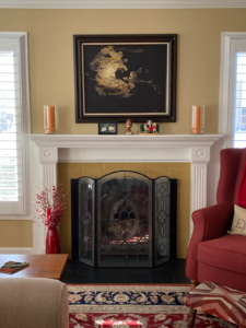 Paint a fireplace surround to match your walls.